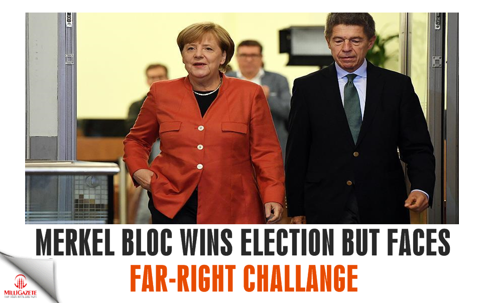 Merkel bloc wins election but faces far-right challenge