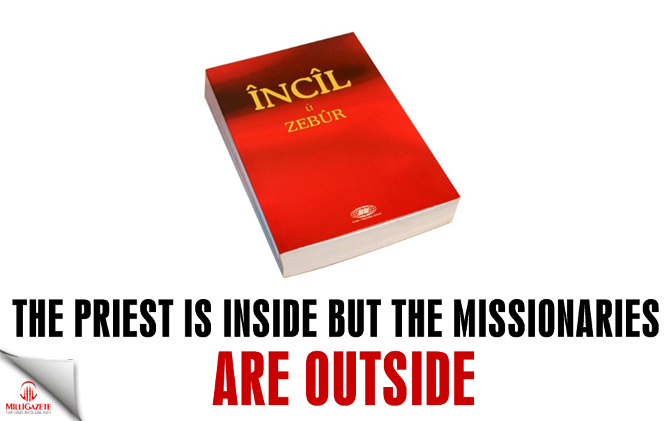 The priest is inside but the missionaries are outside
