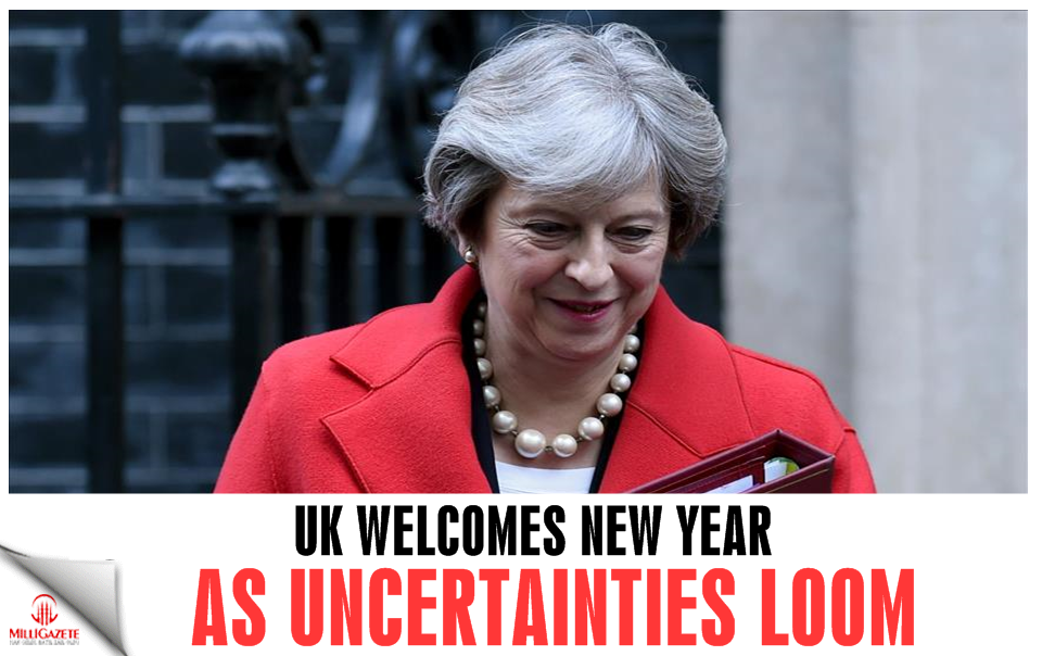 UK welcomes new year as uncertainties loom