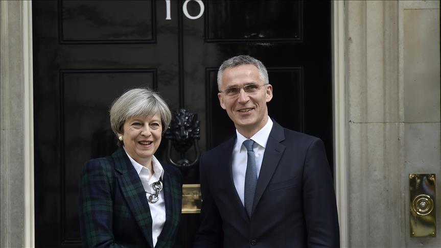 British PM Theresa May hosts NATO chief