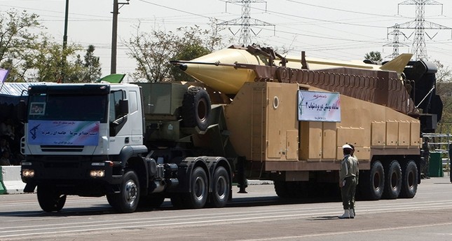 Iran unveils new ballistic missile as Rouhani vows to boost capabilities