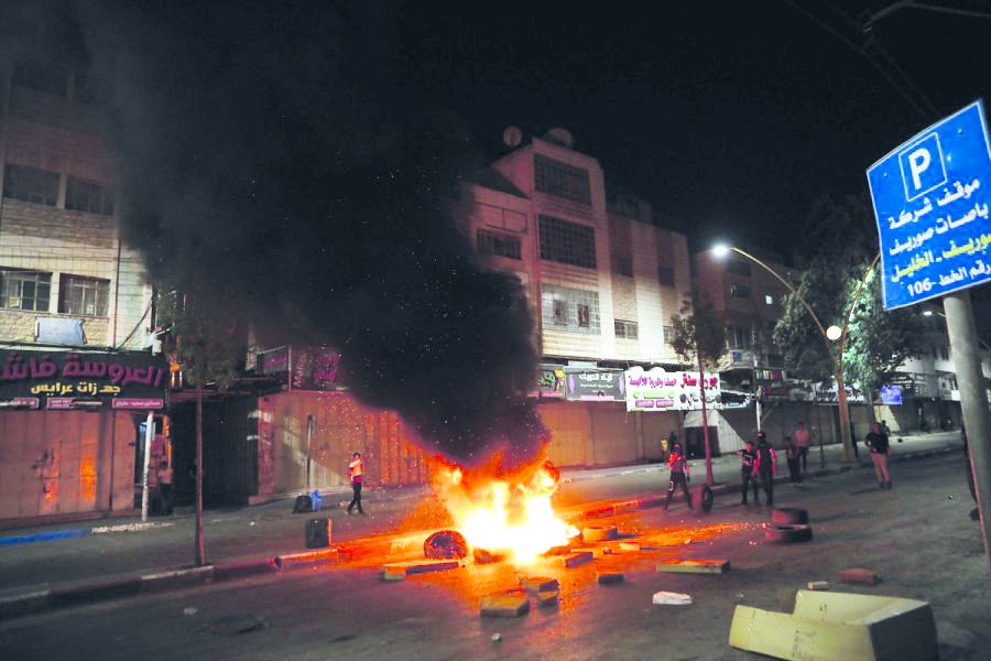 Israeli attacks protested in Haifa and Tel Aviv