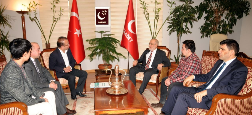 Karamollaoğlu meets Uighur delegation in Ankara