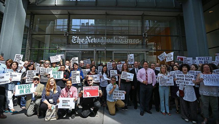 New York Times staff walk off job to protest job cuts
