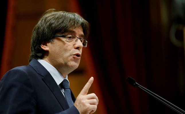 Ousted Catalan leader flees to Brussels, faces sedition charges