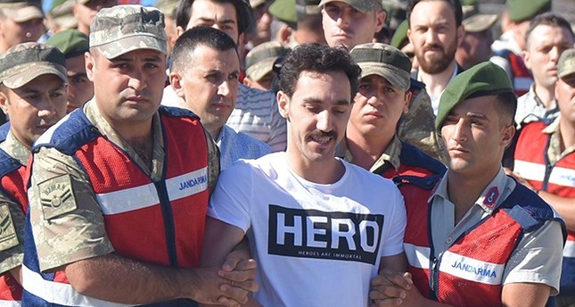 Outrage as smiling Erdoğan assassination plotter appears in ‘hero’ T-shirt before trial