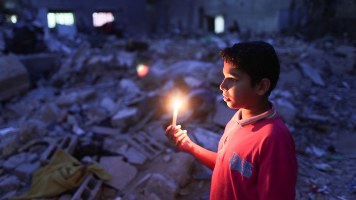 Palestinians in Gaza live by the rubble of their former homes