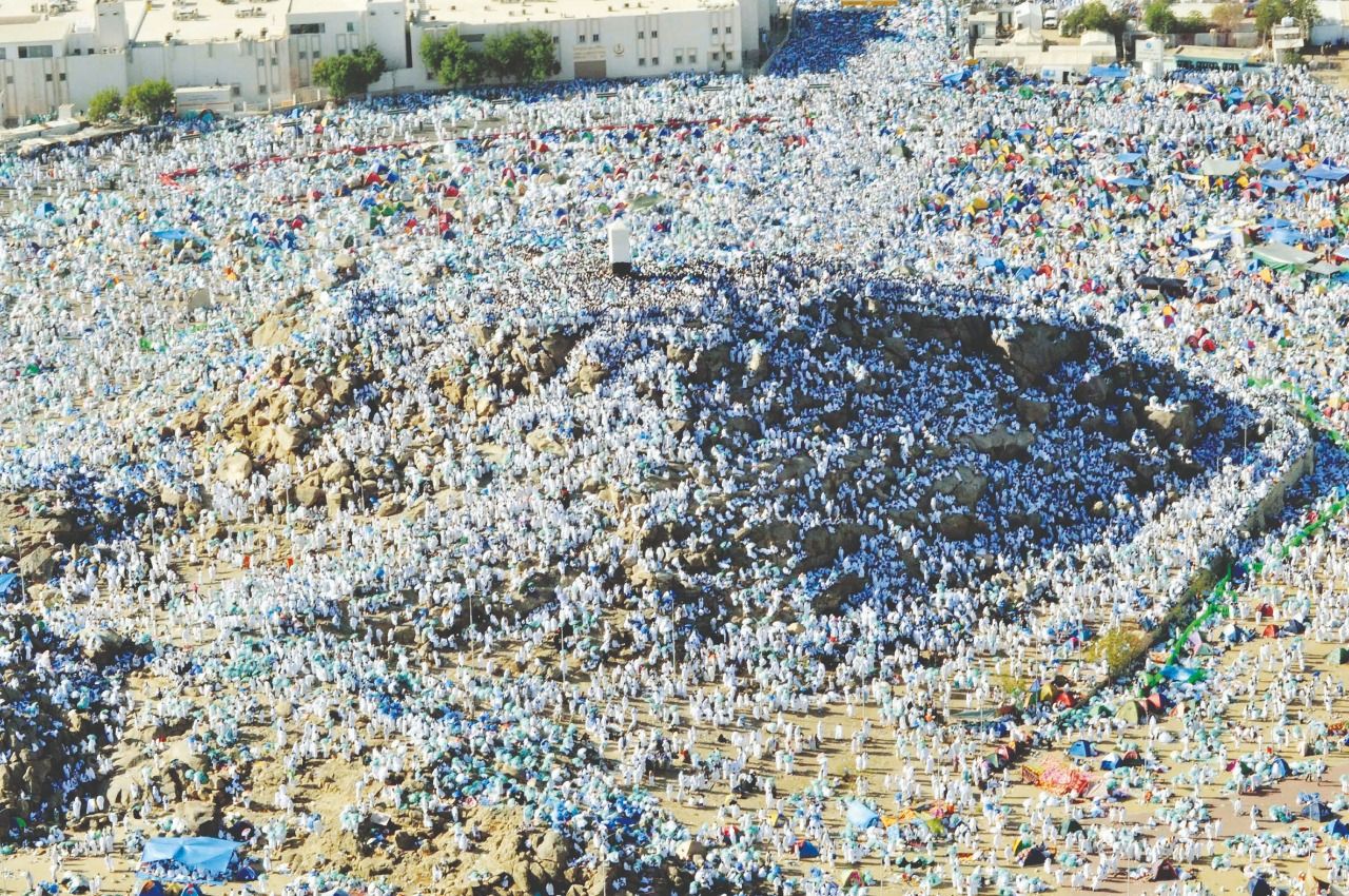 Pilgrims perform the central ritual of Hajj at Arafat Plain