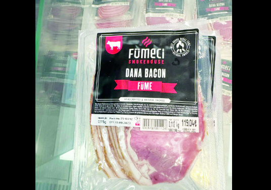 Veal offered for sale with the brand of bacon