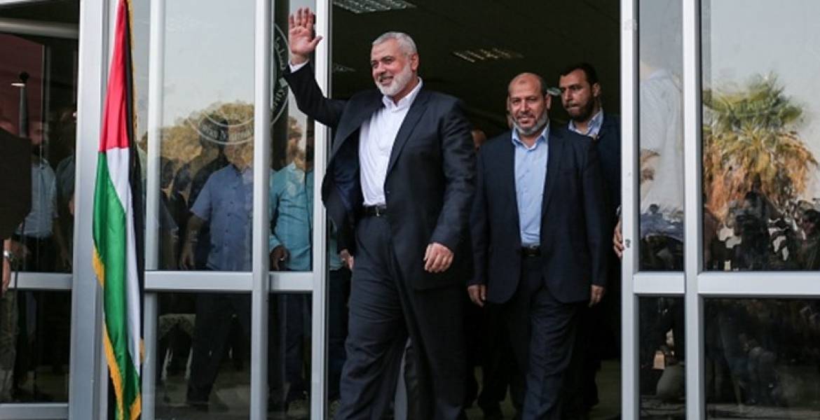 What is behind the foreign tour by Hamas's Haniya?