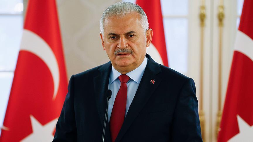 World must react to crimes against humanity: Turkish PM